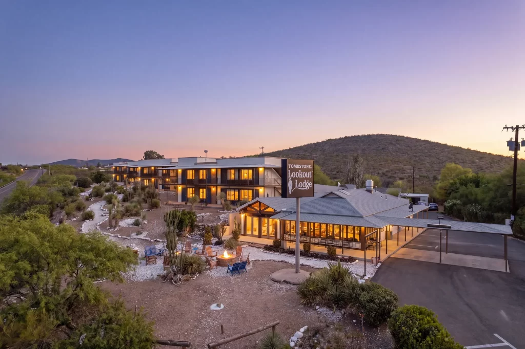 Aerial bird's eye view of Lookout Lodge property in Tombstone, Arizona surrounded by historic Wild West desert landscape