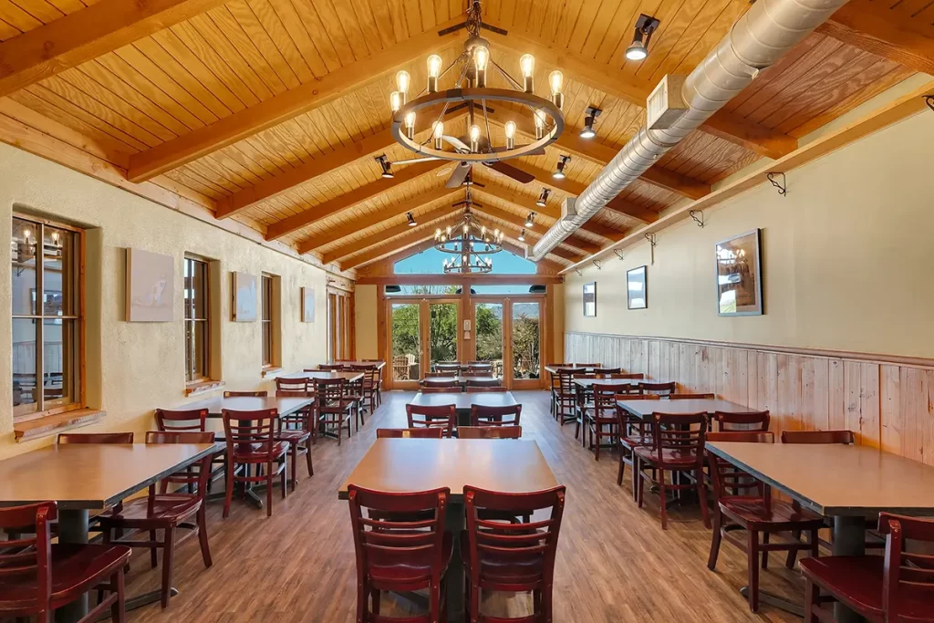 Dining area inside Tombstone Lookout Lodge featuring historic Wild West decor and authentic ambiance for guests