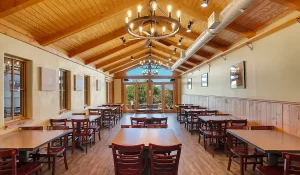 Dining area inside Tombstone Lookout Lodge featuring historic Wild West decor and authentic ambiance for guests