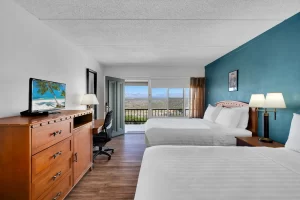 Lawmen Double bed room at historic Tombstone Lookout Lodge with Wild West authentic decor and period furnishings