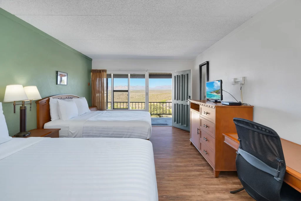 Outlaw Double bed room at Tombstone Lookout Lodge with Wild West themed furnishings and historic ambiance near O.K. Corral