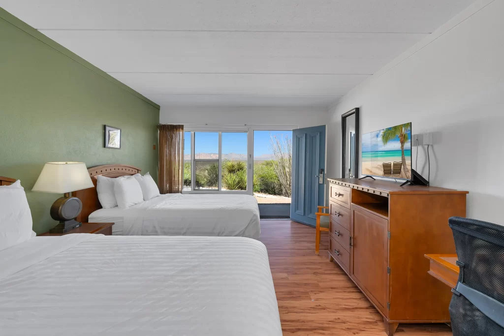 Outlaw Double bed room at Tombstone Lookout Lodge with Wild West themed furnishings and historic ambiance near O.K. Corral