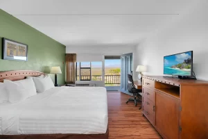 Outlaw King bed room at historic Tombstone Lookout Lodge featuring Wild West themed decor and authentic period furnishings