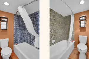 A Lookout Lodge guest bathroom with a tub-shower, decorative Talavera-style tile, terracotta floors, and fresh towels, shown in two room color variations.